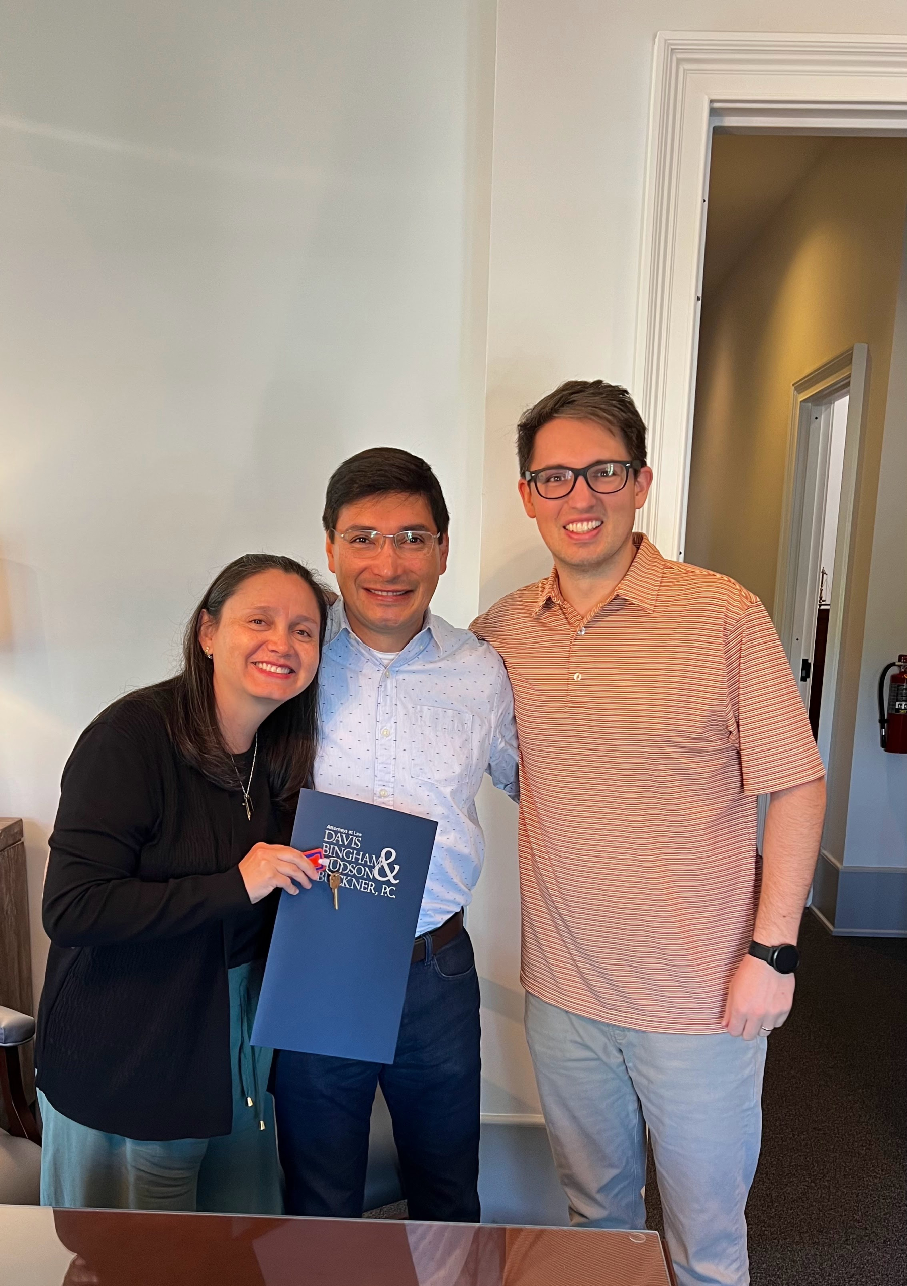 Happy Hayley Real Estate clients at their closing